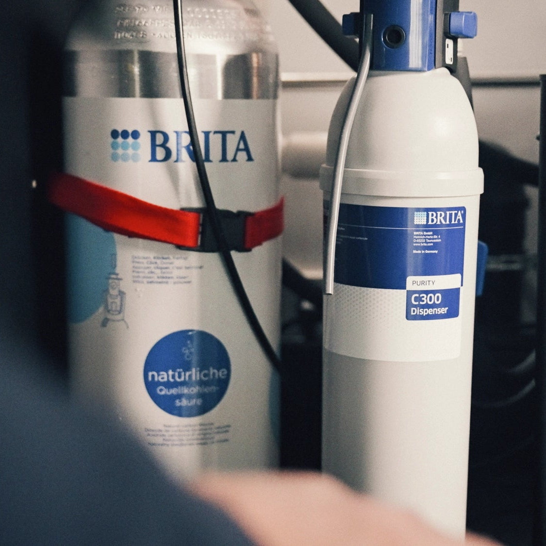 BRITA PURITY C filter next to a CO2 cartridge.